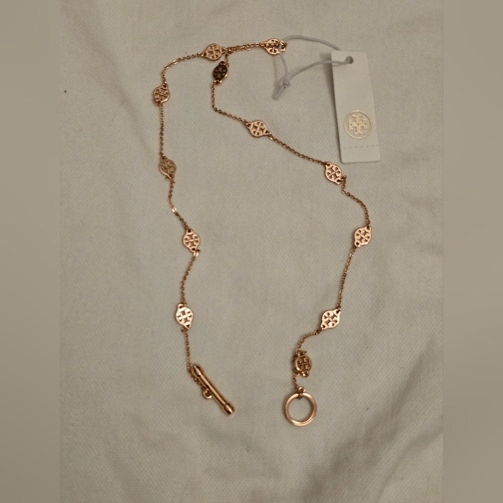 Elegant Gold Necklace with Unique Accents